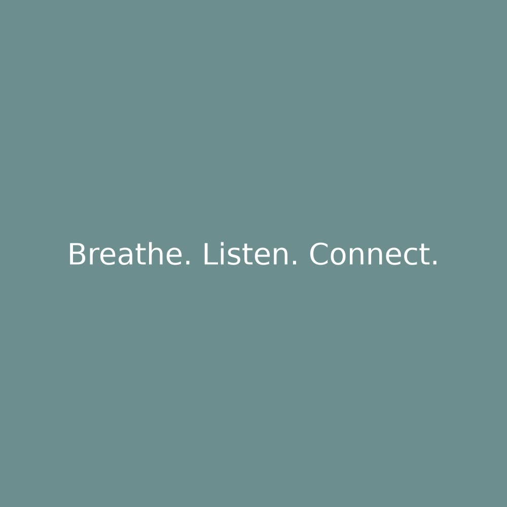 A thoughtful pause during conversation, symbolizing calm listening and connection
